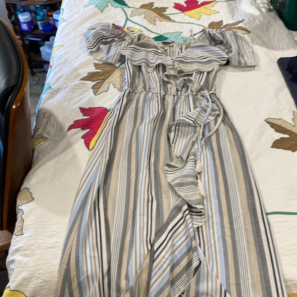 Looking for a light flow dress? This dress is brand new never worn.